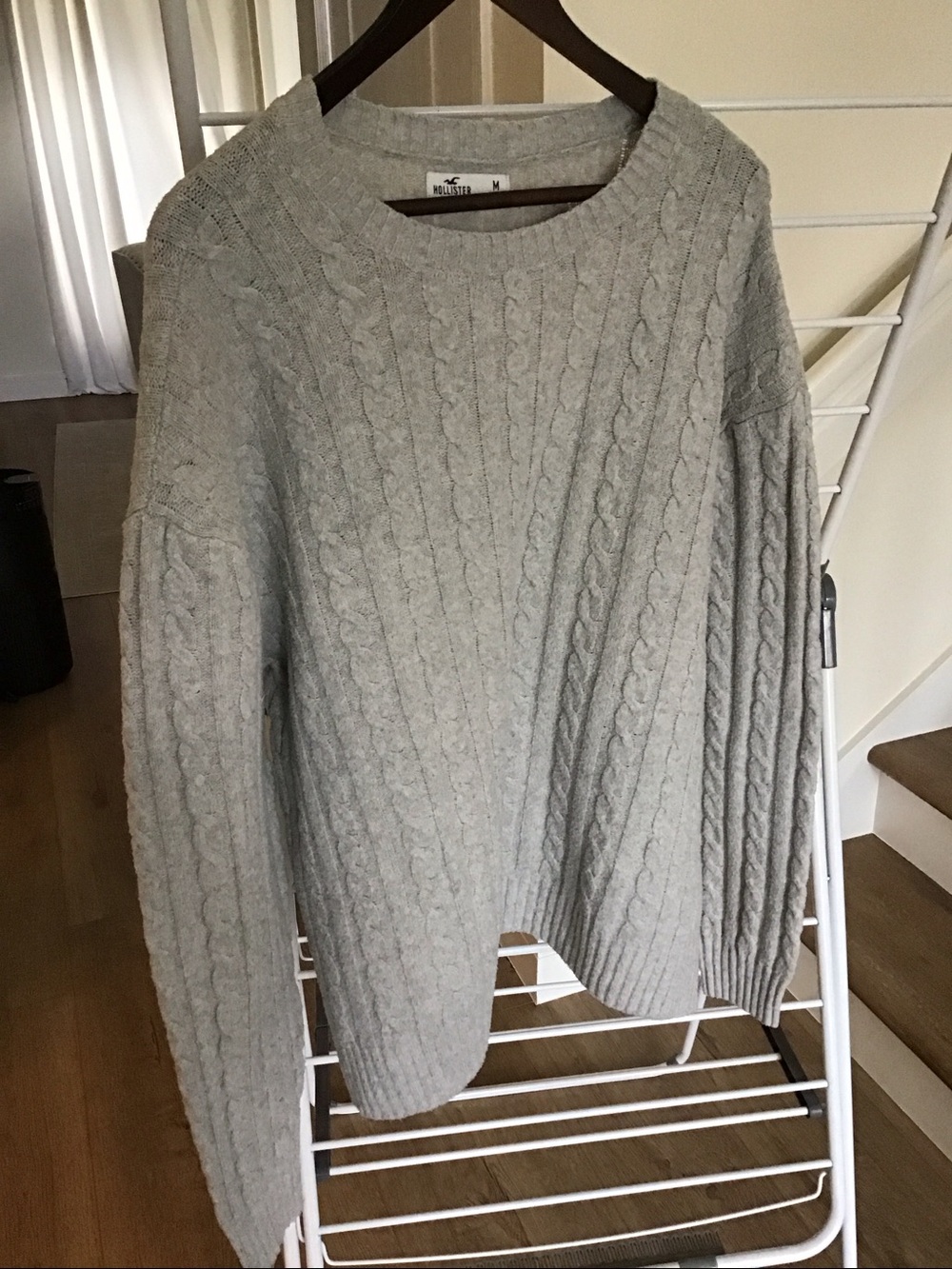 Hollister grey cable-knit crewneck sweater.